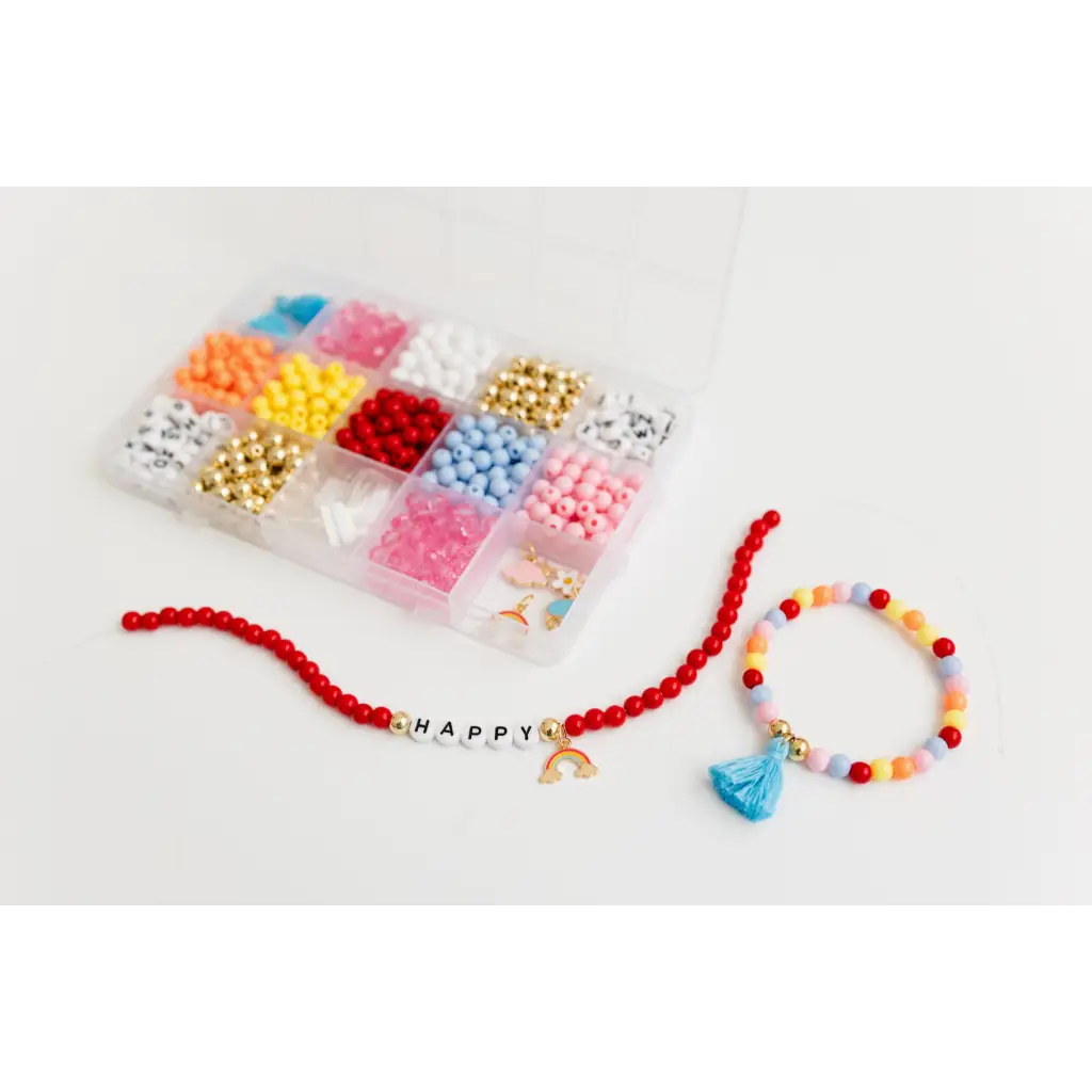Colorful bracelet craft kit with letter beads spelling HAPPY and fun charms for stretchy bracelets