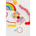 Colorful craft supplies for the Color My World Bracelet Craft Kit for stretchy bracelets