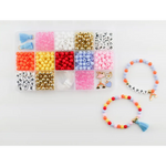 Bead organizer box filled with colorful beads and finished stretchy bracelets from Color My World Bracelet Craft Kit