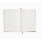 Open pink journal with lined pages from Colorblock A5 Softcover Undated Page A Day Planner, perfect for stylish womens clothes and polished prints