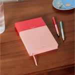 Two-toned pink diary with matching pens from Colorblock A5 Softcover Undated Planner