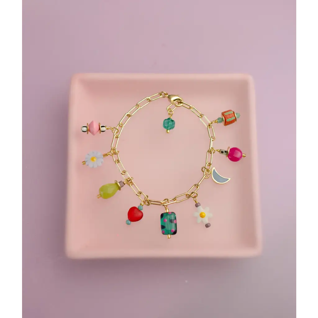Gold-toned charm bracelet with colorful flower moon charms