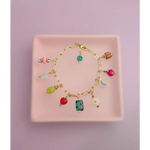 Gold-toned charm bracelet with colorful flower moon charms