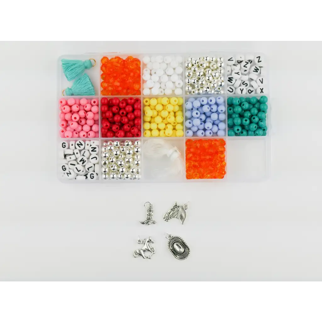 Colorful beads and charms for making stretchy bracelets in a fun bracelet craft kit