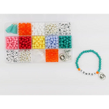 Bead organizer box with colorful beads and a finished Cowboy Romance Stretchy Bracelet