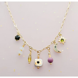 Dainty flower beaded charm necklace with gold celestial motifs and colorful gems