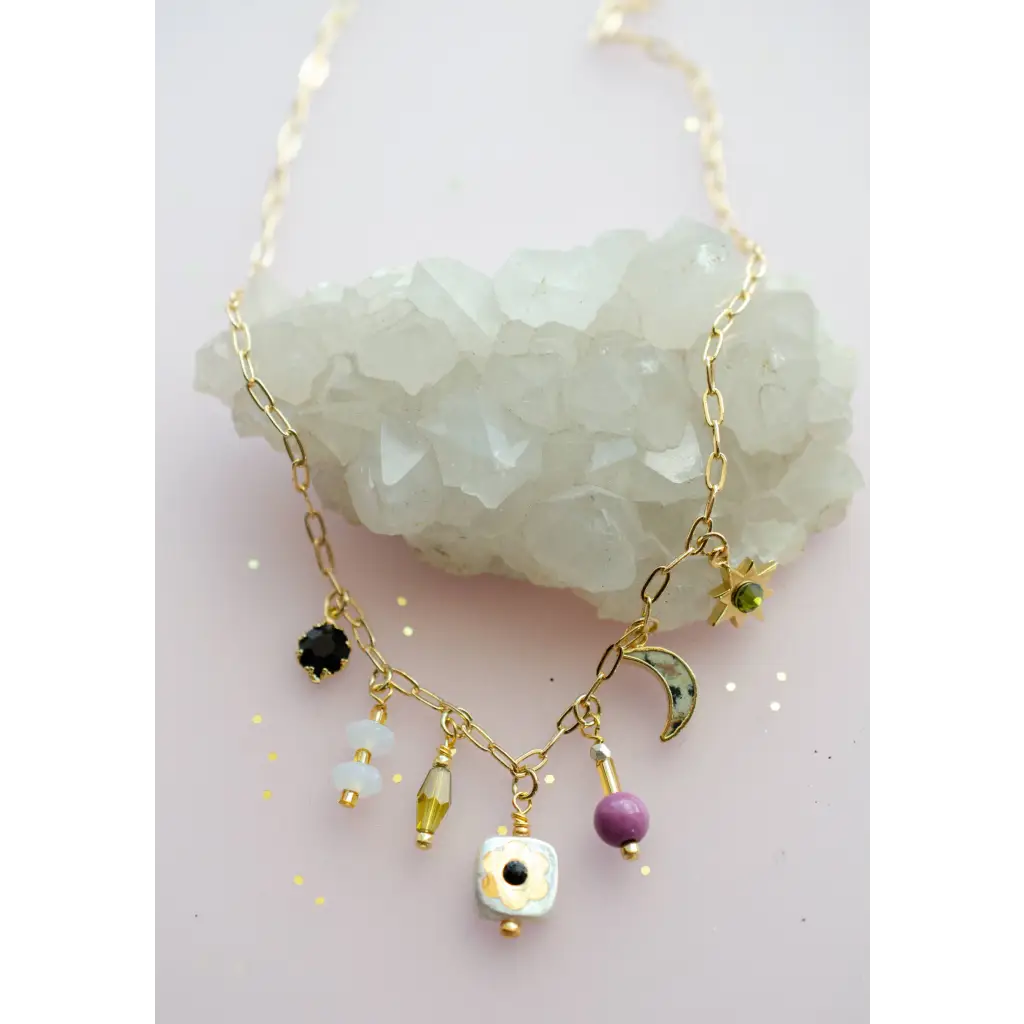 Dainty flower beaded charm necklace with gold celestial moon star beads