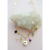 Dainty flower beaded charm necklace with gold celestial moon star beads