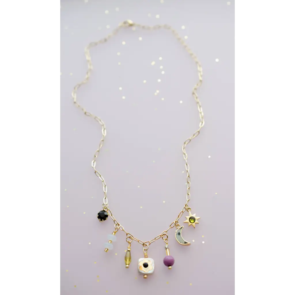 Dainty flower beaded charm necklace with celestial star moon beads