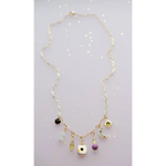 Dainty flower beaded charm necklace with celestial star moon beads