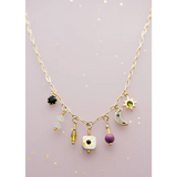 Dainty flower beaded charm necklace in gold with celestial motifs