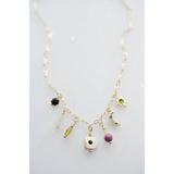 Dainty flower beaded charm necklace with gold chain, black gem, moon, star