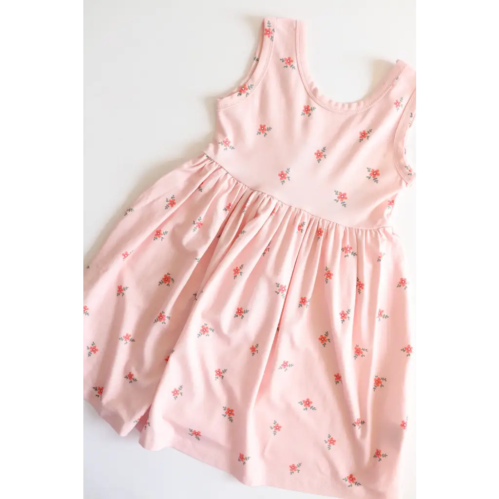 Cute Pink Daisy Twirl Dress with Floral Print for playful summer vibes