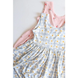 Light blue floral daisy twirl dress with gathered waist and pink trim for fun adventures