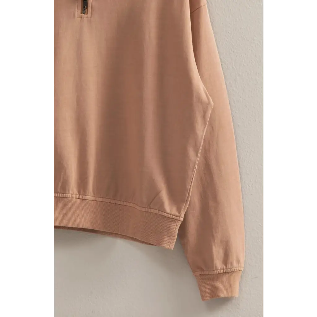 Peach-colored Danica Half Zip Long Sleeve Sweatshirt, a stylish pick for moms