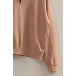 Peach-colored Danica Half Zip Long Sleeve Sweatshirt, a stylish pick for moms