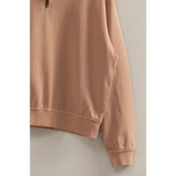 Peach-colored Danica Half Zip Long Sleeve Sweatshirt, a stylish pick for moms