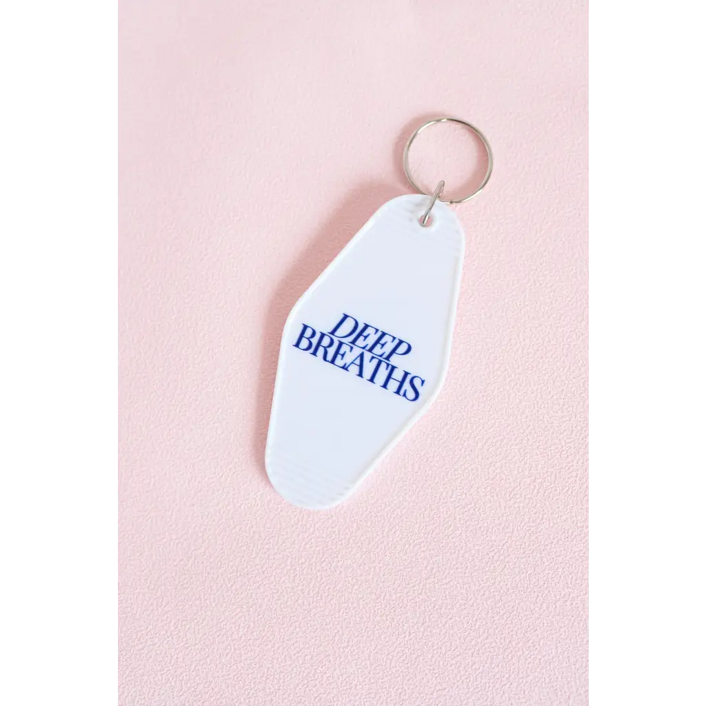 White vintage hotel keychain with Deep Breaths text for calm moments