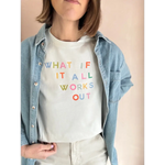 Light-colored short-sleeved T-shirt with colorful text worn under denim shirt at Craft Bar