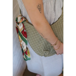 Diana Woven Bag XL in vegan leather with two interior pockets, worn with striped shirt