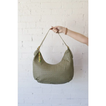 Olive green woven leather Diana Woven Bag XL with colorful beaded tassel and two interior pockets