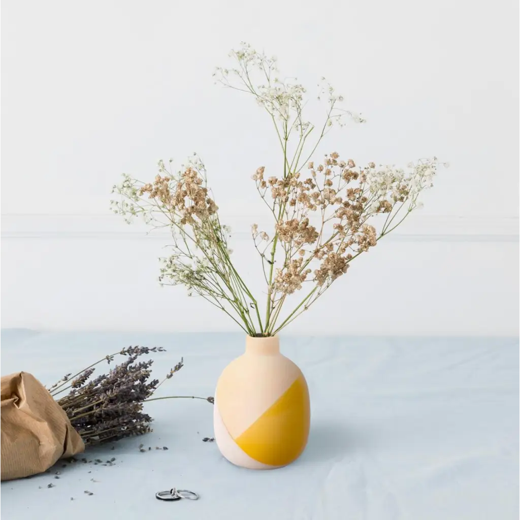 Two-toned Dipped Glaze Bud Vase with dried flowers, perfect for polished prints decor
