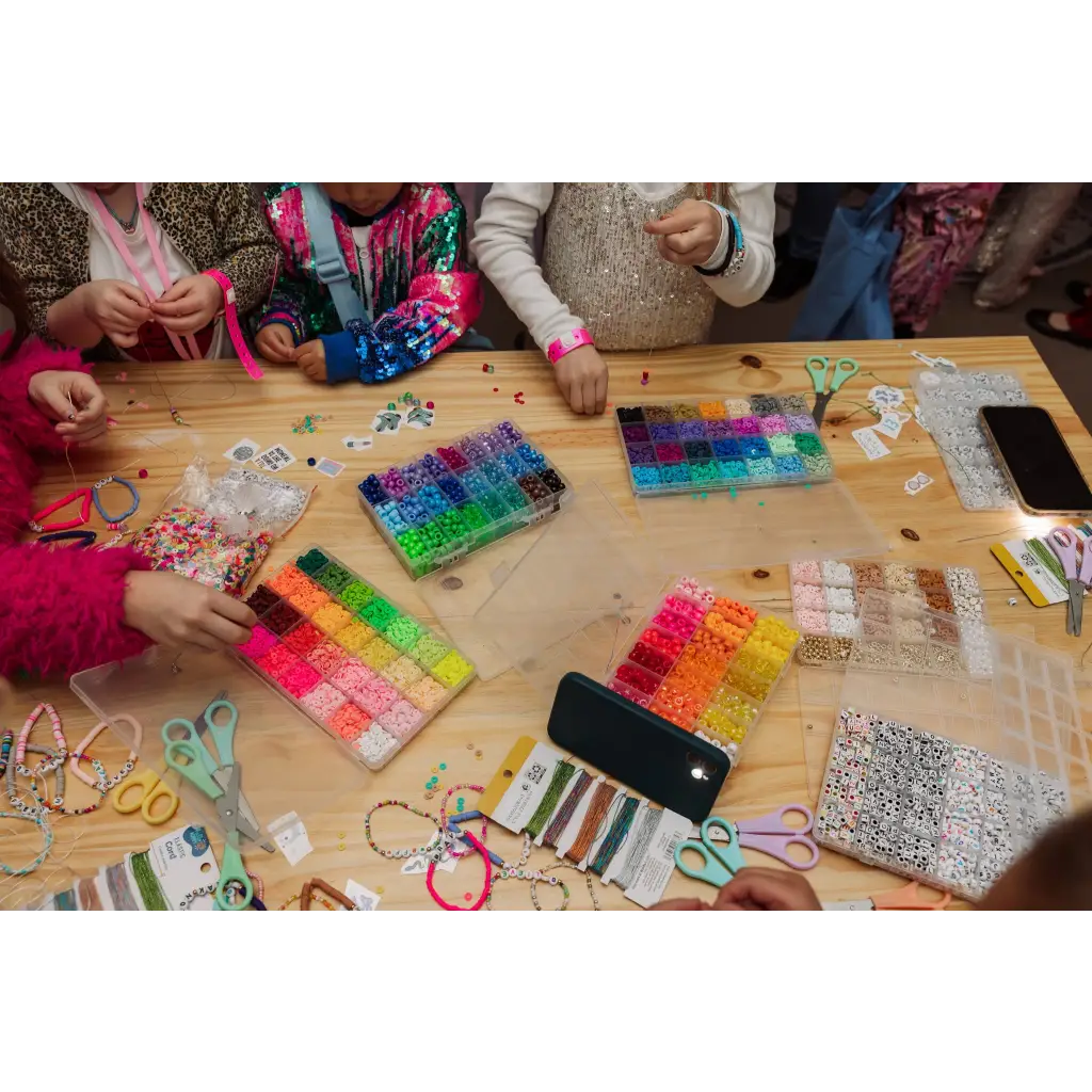 Colorful rubber bands and crafting supplies for DIY Friendship Bracelet Set Includes Beads