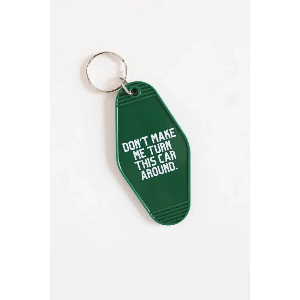 Green vintage hotel keychain with funny text Don’t Make Me Turn the Car Around
