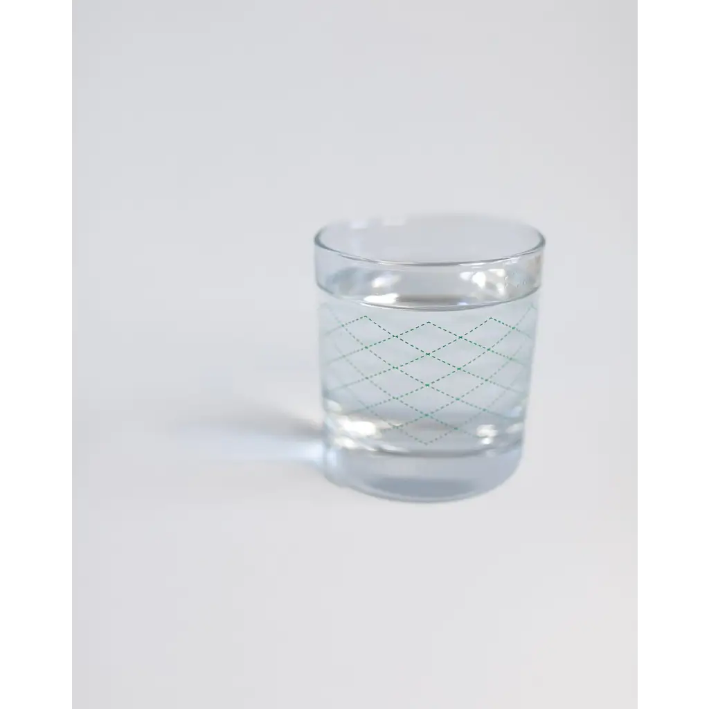 Clear glass tumbler with diamond pattern, perfect for a heavy-based 10oz gingham cocktail glass