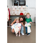 Family enjoying custom shirts at Edwardsville Craft Bar’s Daily Reservations