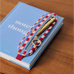 Blue elastic notebook pen pouch with zippered pen case and stylish prints