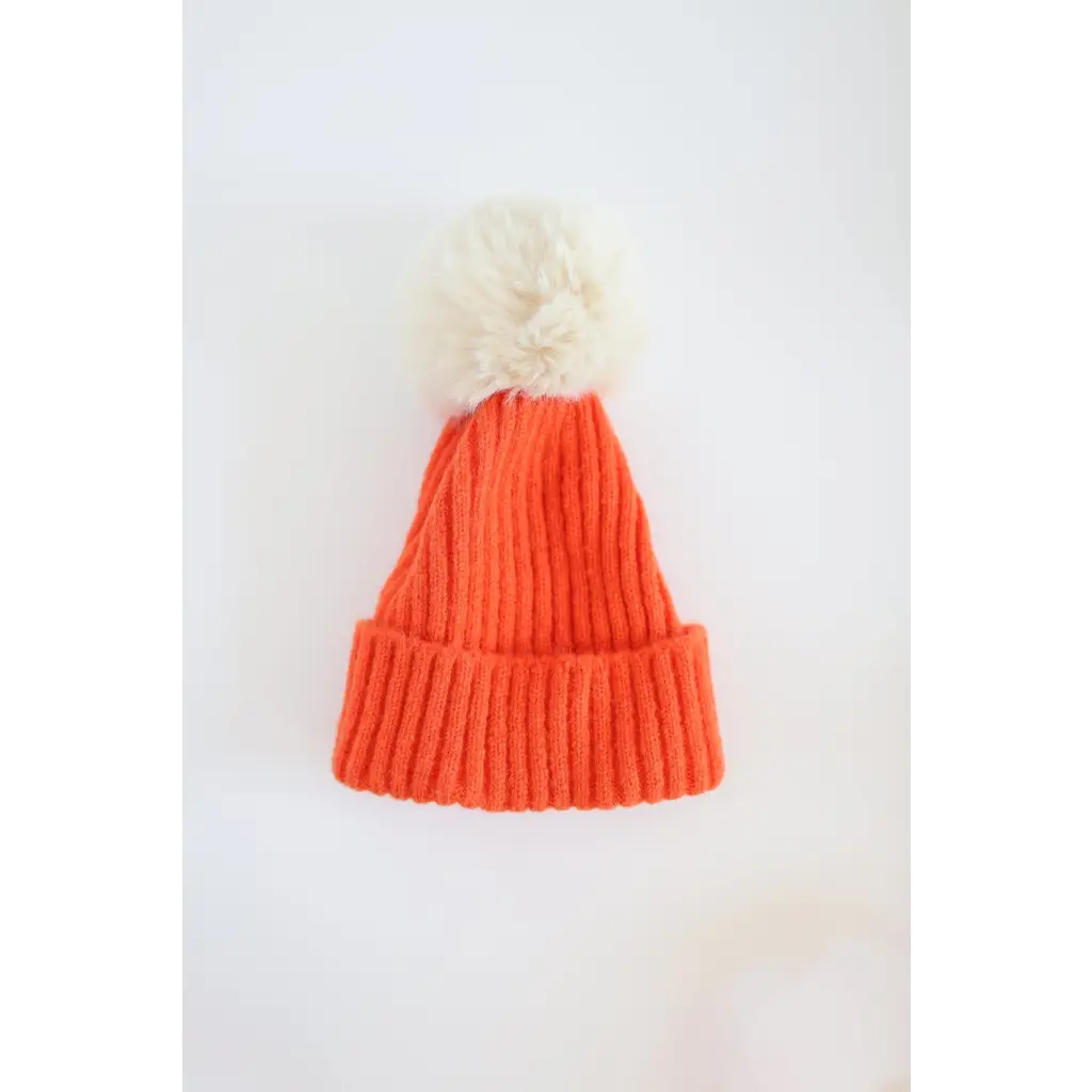 Orange knit Eloise Pom Pom Beanie for Kids & Baby, cute addition to stylish womens clothes