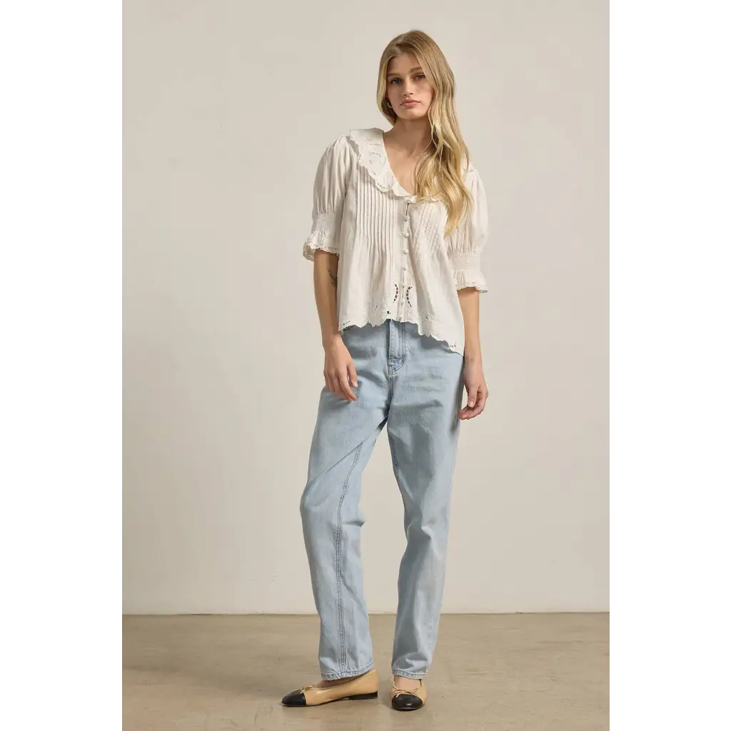 Soft off-white woven fabric blouse with embroidered collar and lace trim