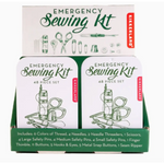 Emergency Sewing Kit display with tools for quick fixes on polished prints and stylish womens clothes