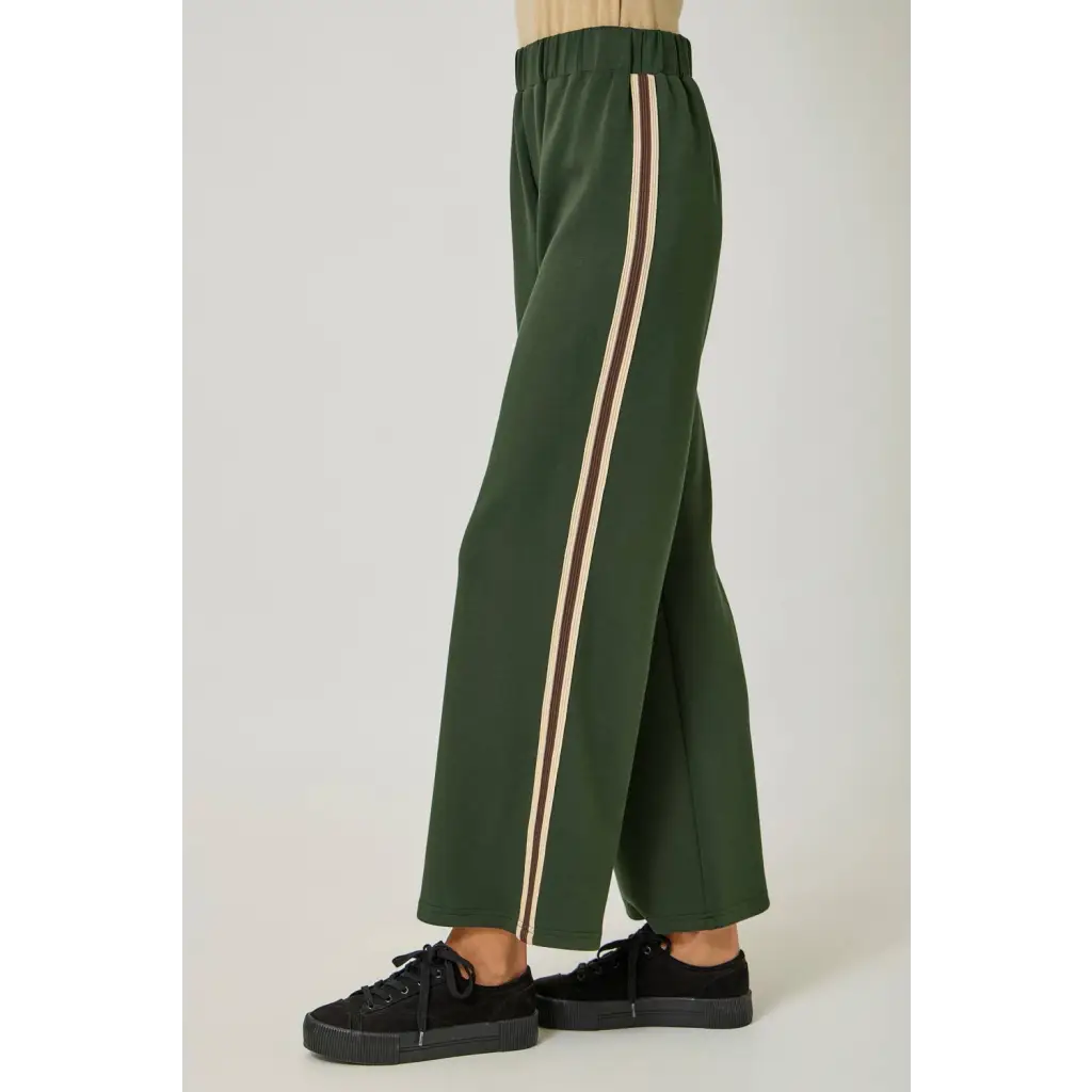 Olive green tracksuit pants with embroidered stripes and elastic waist, stylish womens clothes