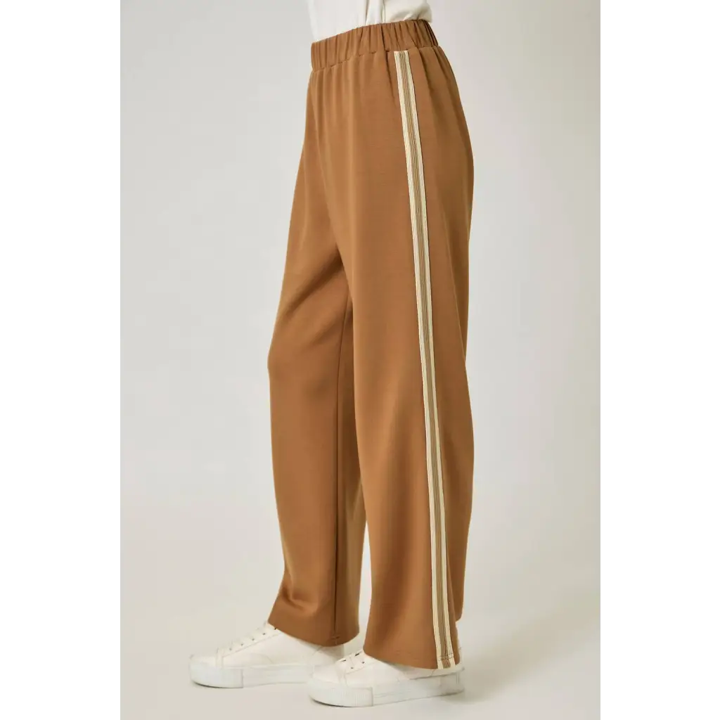Olive green everyday tracksuit pants with tan wide-leg and striped panels