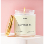 White candle in jar with Everything is Fine label and pineapple sparkling citrus scent