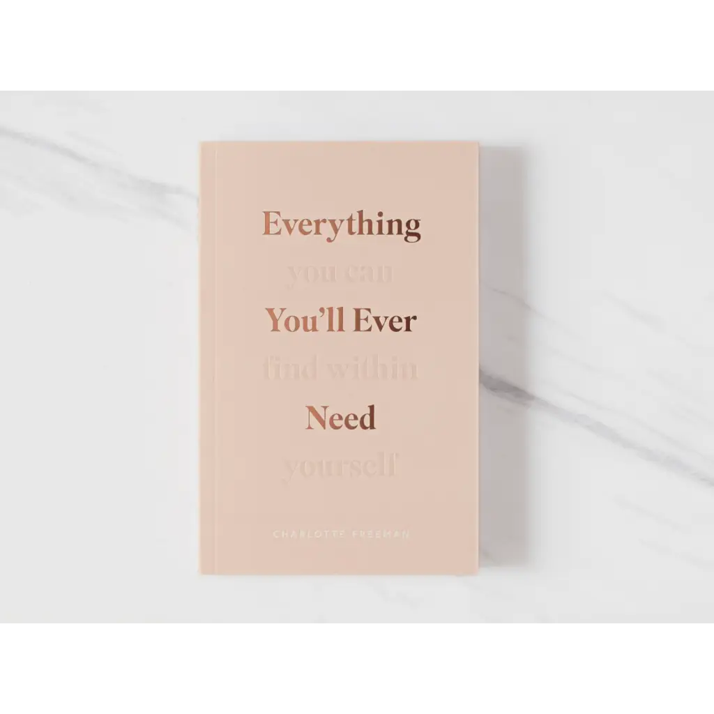 Peach minimalist book Everything You’ll Ever Need on marble