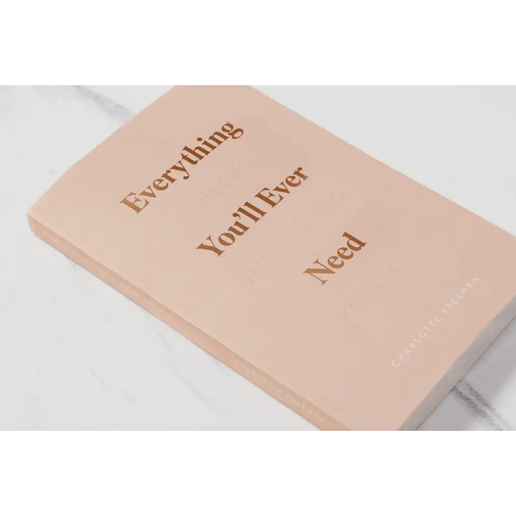 Peach leather notebook with gold Everything Youll Ever Need embossed text