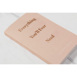 Peach leather notebook with gold Everything Youll Ever Need embossed text