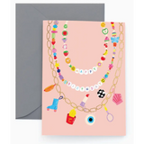 Stylish birthday card featuring colorful charms and beaded letter garlands