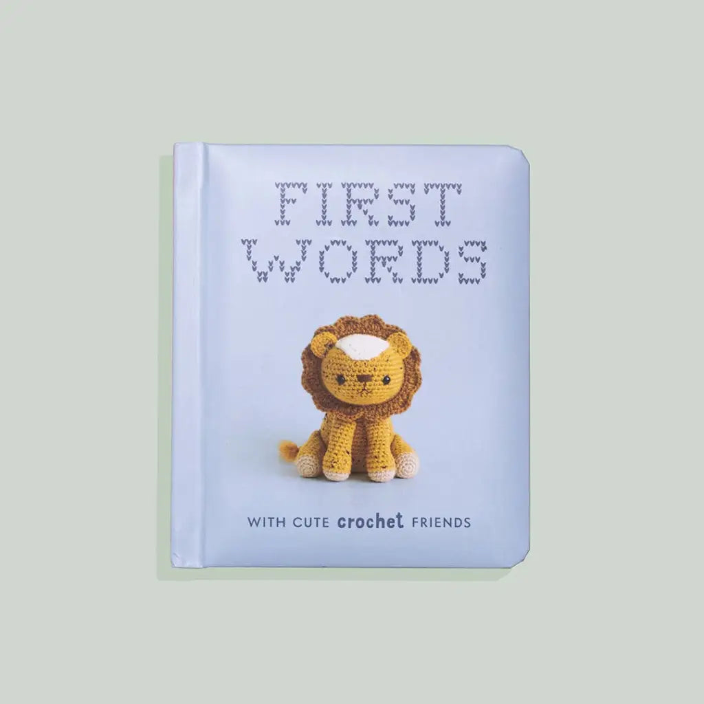 Baby board book with cute crochet friends and a crocheted lion cover for baby showers