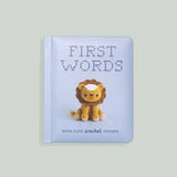 Baby board book with cute crochet friends and a crocheted lion cover for baby showers