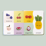 Open First Words with Cute Crochet Friends Baby Board Book showing crocheted fruit illustrations