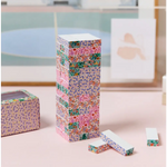 Colorful Floral Tumbling Tower with blocks removed, perfect for family fun!