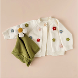 White knit cardigan with colorful flower appliques from the Organic Cotton Flower Cuddly Lovey set