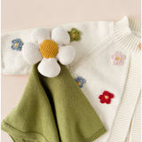 Knitted white daisy on olive green fabric in Organic Cotton Flower Cuddly Lovey set