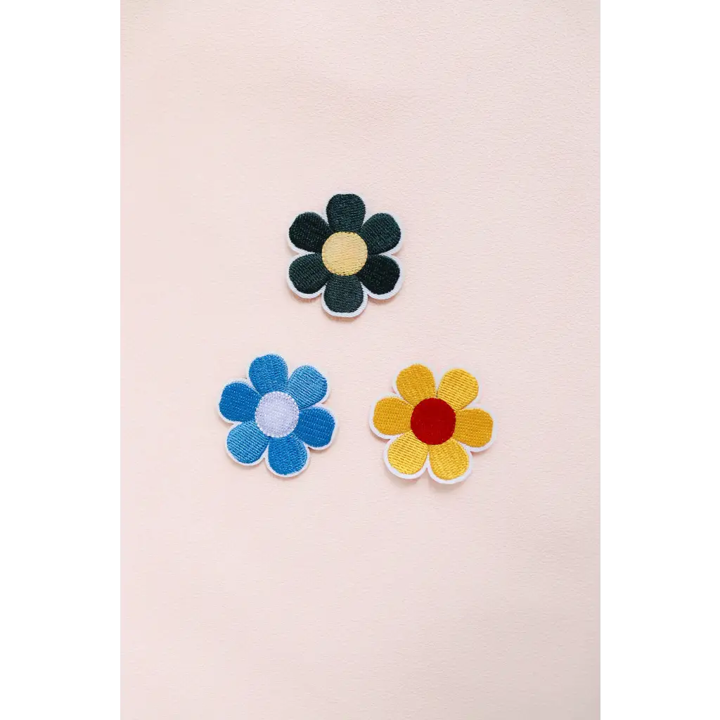 Retro flower patches in black, blue, and yellow for fun DIY fashion projects