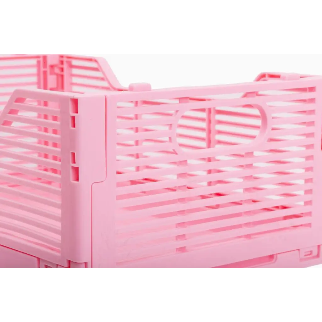 Pink slotted plastic Folding Storage Crate for stylish storage solutions