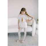 Child in Good Vibes White T-shirt and flexible lightweight Forest Dweller Leggings